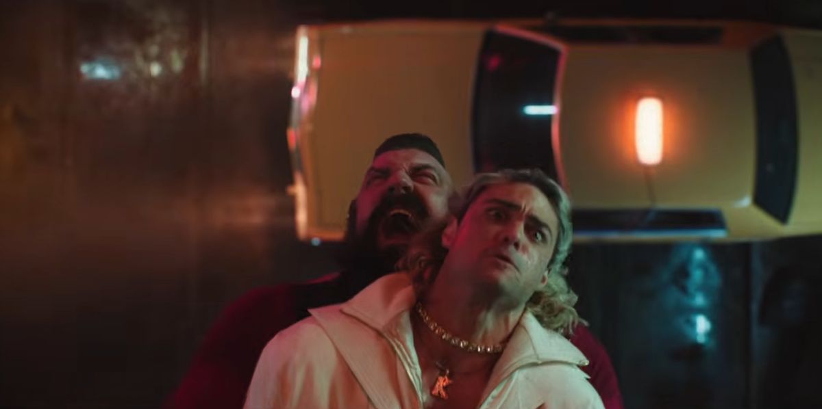 Ken about to get suplexed through a taxi by Zangief in the Street Fighter movie