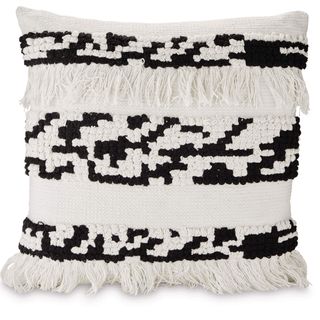 white cushion knitted with black colour