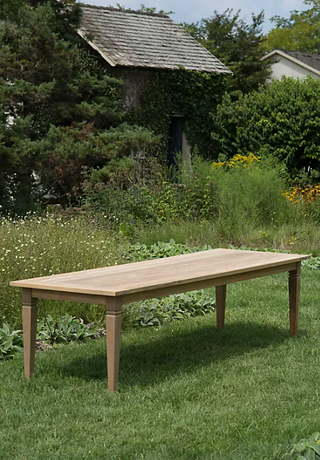 Outdoor wooden dining table from Anthropologie.