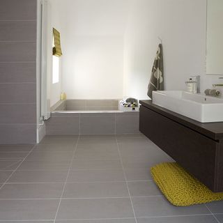 porcelain tile bathroom flooring with washbasin