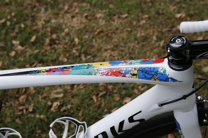 Michal Kwiatkowski's bike has been given the rainbow treatment