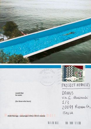 ’Pool’ by Abdel Harraga. A postcard with an image of a long pool with a woman swimming across it next to a lake.