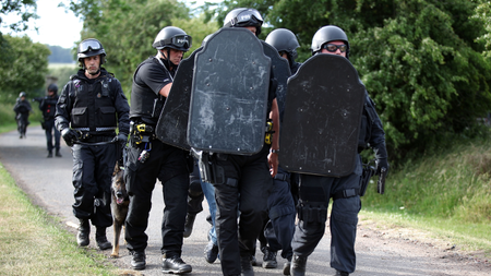 Armed police with dogs carrying out the search for Raoul Moat 