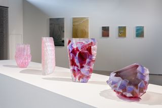 four pink stone shapes on display at the ’Translucency’ exhibition, 8th Tallinn Applied Art Triennial at Kai Art Center