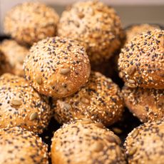 sesame seeds covering small round buns