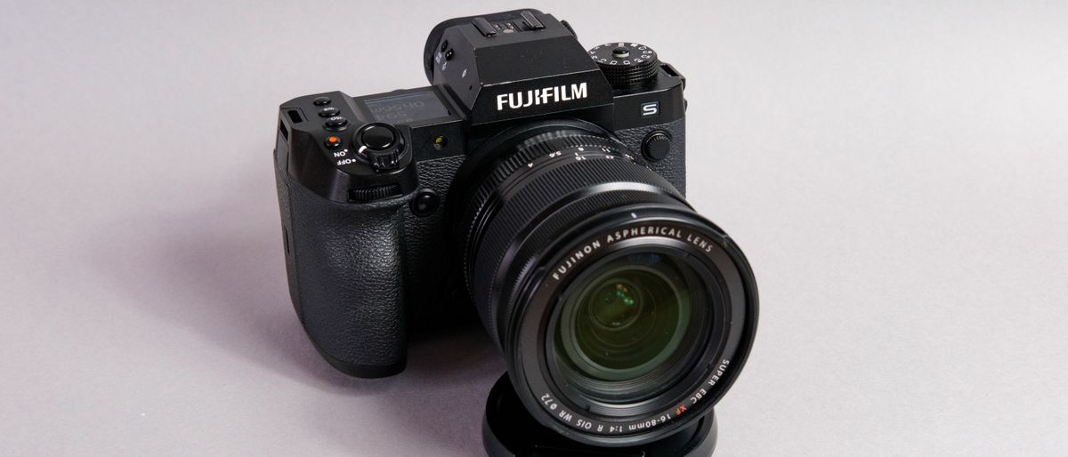 A photo of the Fujifilm X-H2S against a gray background.