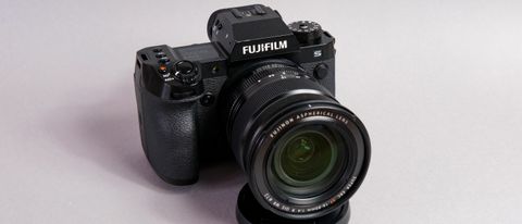 A photo of the Fujifilm X-H2S against a gray background.