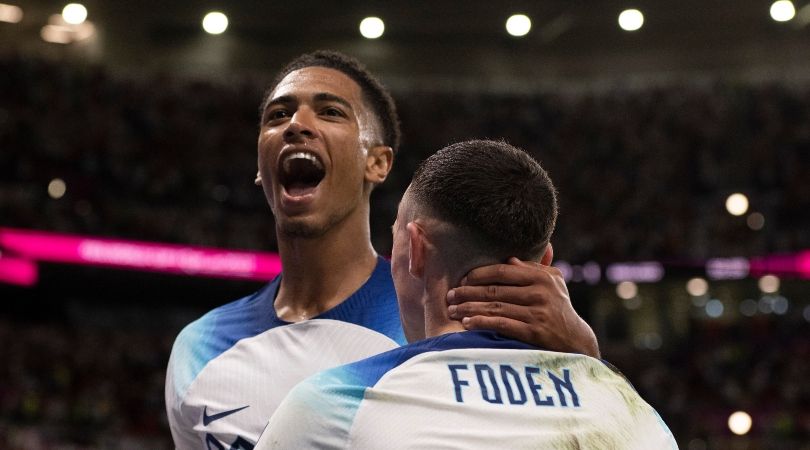 Phil Foden and Jude Bellingham celebrate a goal during England&#039;s 3-0 win over Wales at World Cup 2022.