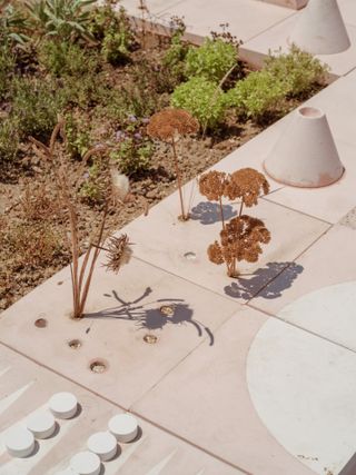 sculptural urban furniture and paving at Studio Ossidiana's floating garden