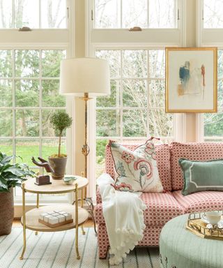 conservatory living space with pink and green decor