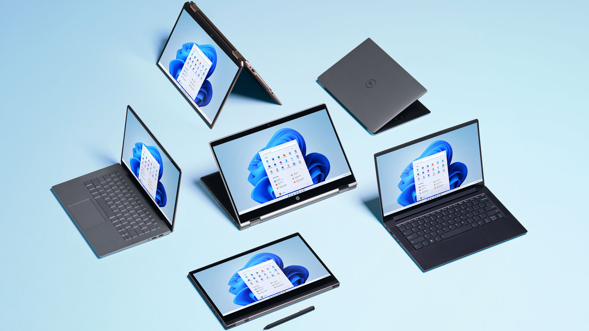 a collection of Windows 11 laptops