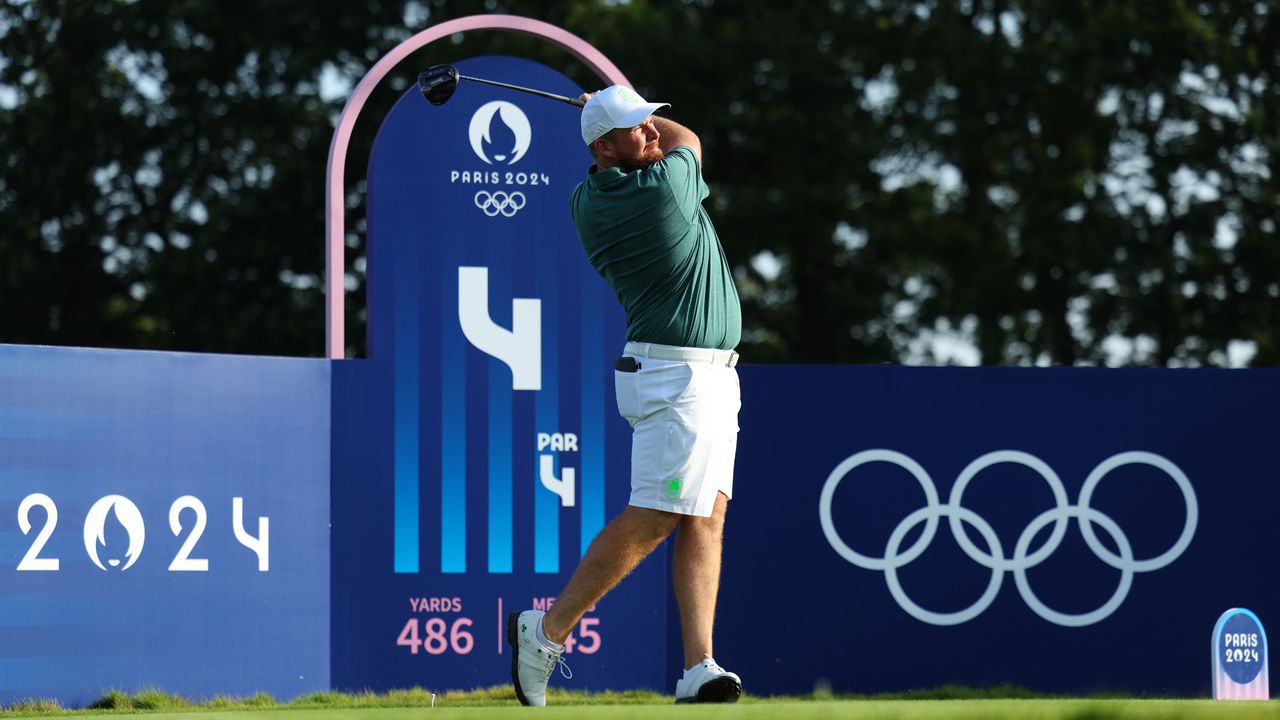 Shane Lowry takes a tee shot during a practice round before the Olympics at Le Golf National