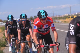 Chris Froome stays safe in the peloton