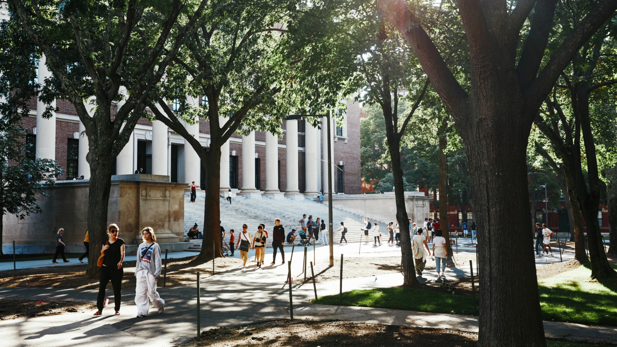 Students walk on the campus of Harvard University in Cambridge, Massachusetts.