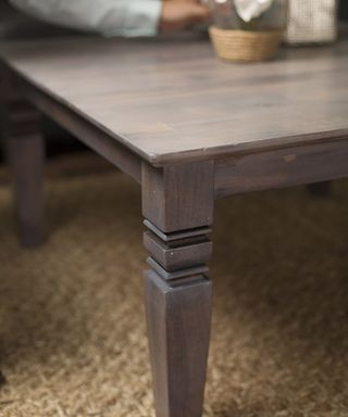 An upcycled coffee table using Rust-Oleum VARATHANE® Weathered Wood Accelerator