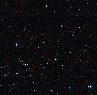 Each of the galaxies, marked by the red crosses, were seen as they were between three and five billion years after the Big Bang. 