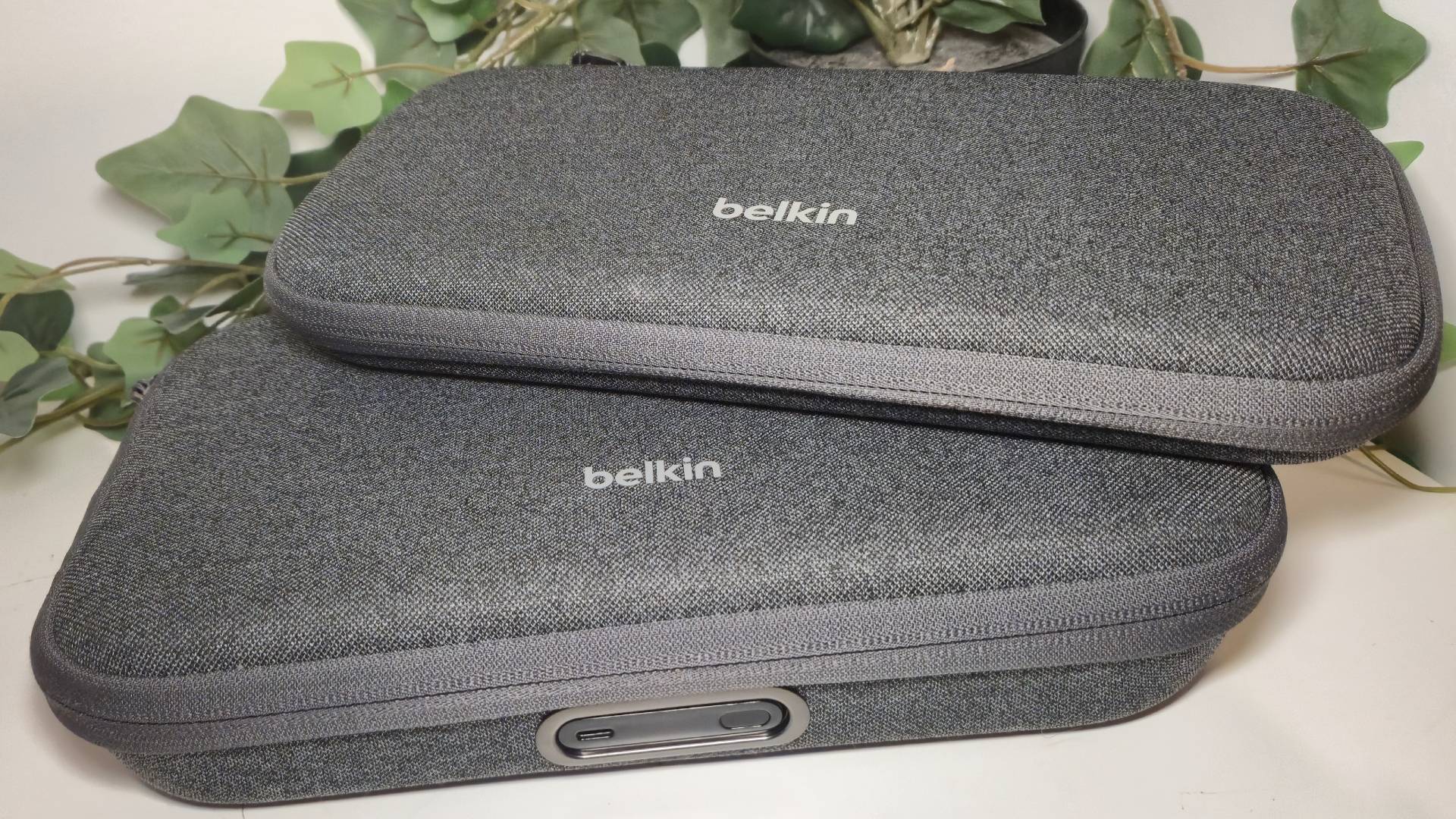 Photo of the Belkin Carrying Case sitting on top of the Belkin Charging Case Pro.