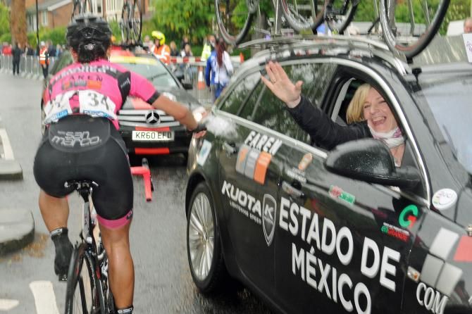 Rossella Ratto rides to the podium after winning stage 2