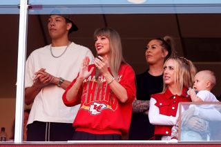 Taylor Swift attending chiefs games in chiefs color outfits