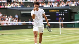 Carlos Alcaraz celebrates a point at Wimbledon 2024