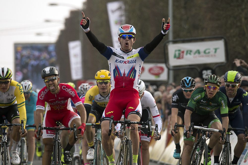 Alexander Kristoff celebrates as he crosses the finish line.