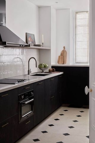 A checkerboard floor kitchen
