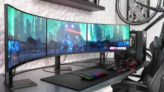 Three HP Omen 27c monitors together on a desk