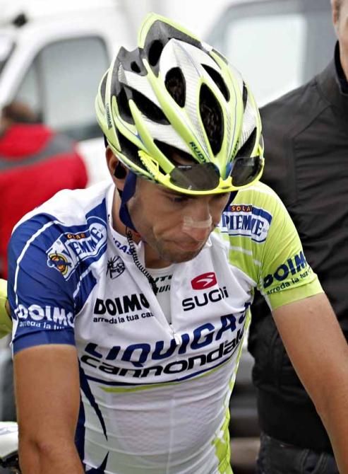A tired Vincenzo Nibali at the summit of the Angliru in 2011.