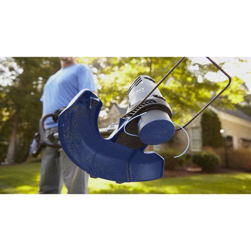 This Kobalt trimmer has a guide bar that will help you cut straight lines as you edge, and it also provides a buffer to protect plants and flowers.