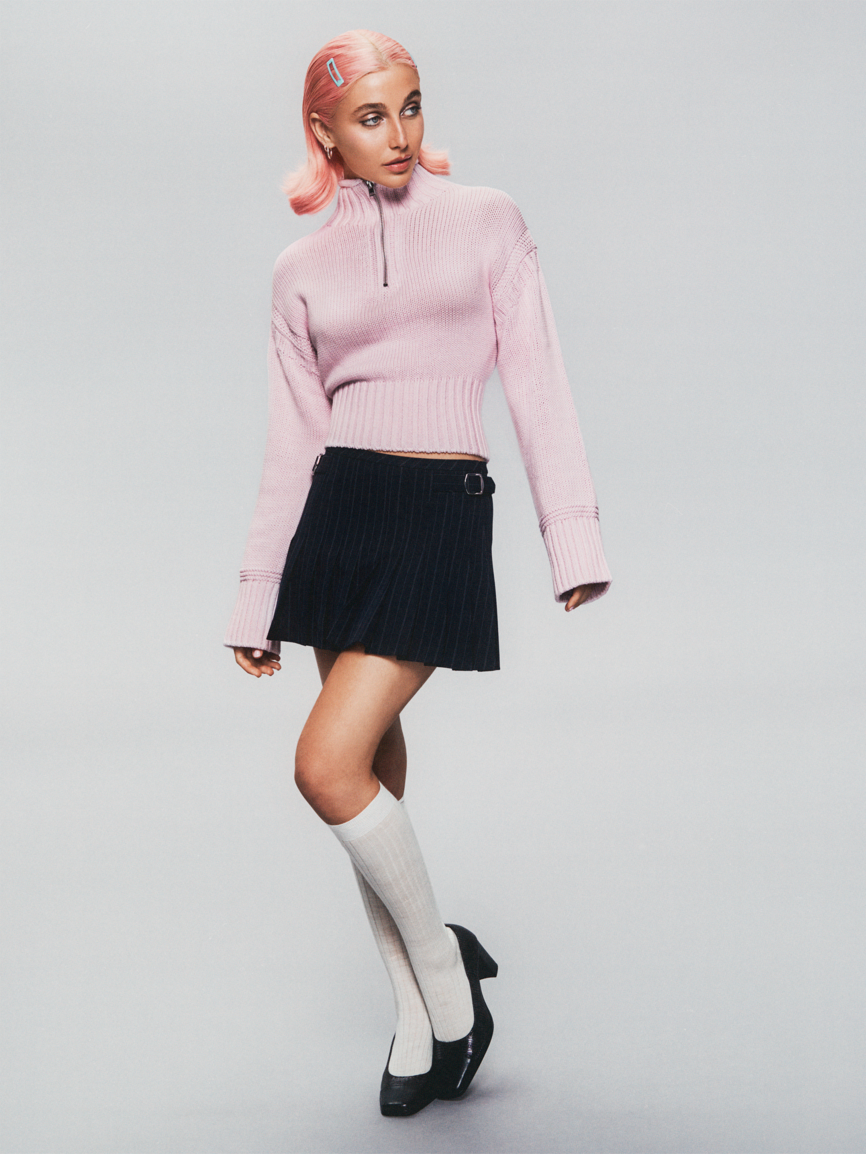 Emma Chamberlain modeled for the J.Crew Tiny Rollneck Sweater campaign