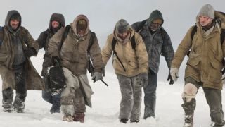 Liam Neeson leading others in The Grey