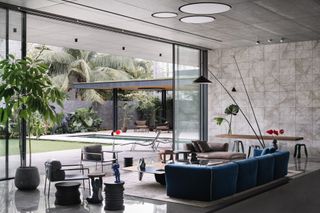 Minimalist living space in Hyderabad home designed by Kanan Modi Associates