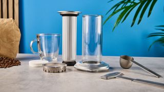 a glass AeroPress premium with aluminum flourishes 