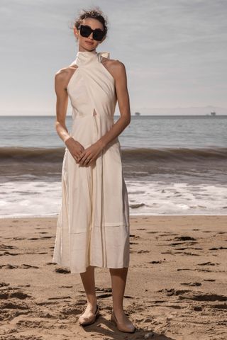 a model wears the Heidi Merrick Ginger Dress - Ivory Silk & Hemp first worn by Meghan Markle