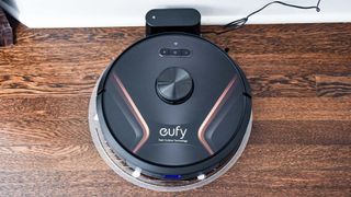Eufy RoboVac X8 Hybrid docked onn charger