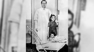 Lina Medina pictured in 1941 with one of her doctors and her son