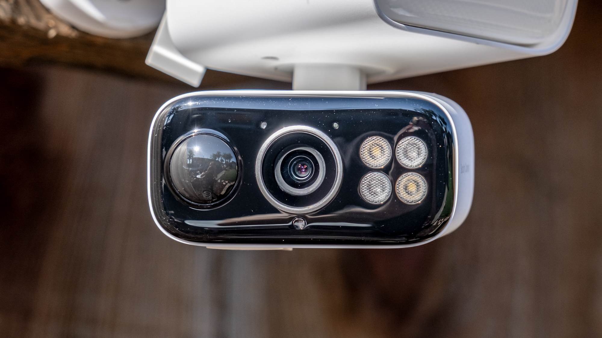 A TP Link Tapo C615F security camera mounted to a fence