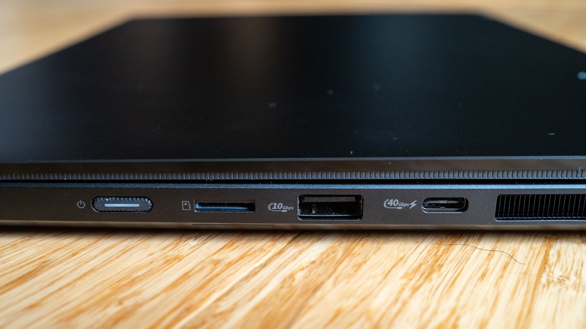 Asus ProArt PX13 laptop on a wooden surface