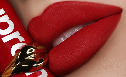 Pat McGrath and Supreme lipstick on woman's lips 