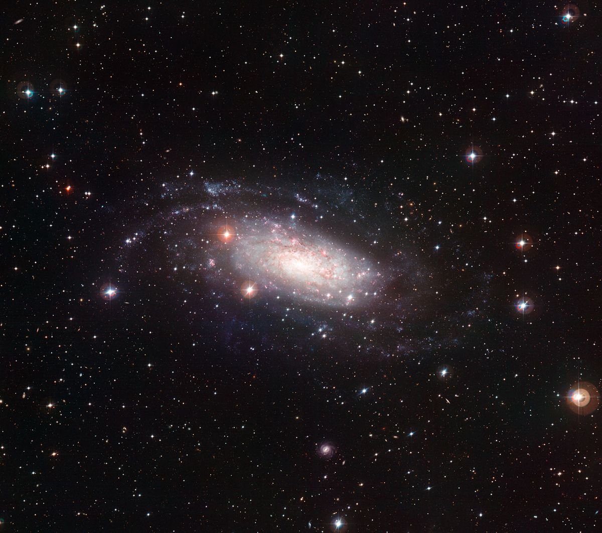 Oddball Spiral Galaxy Is Flat As A Pancake Space