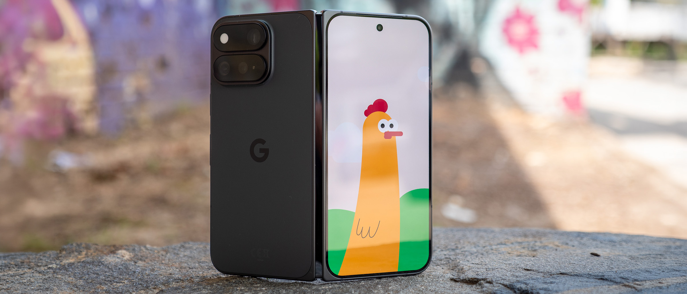 The Made You Look feature on a Google Pixel 11 Pro Fold showing an animated chicken on the front screen