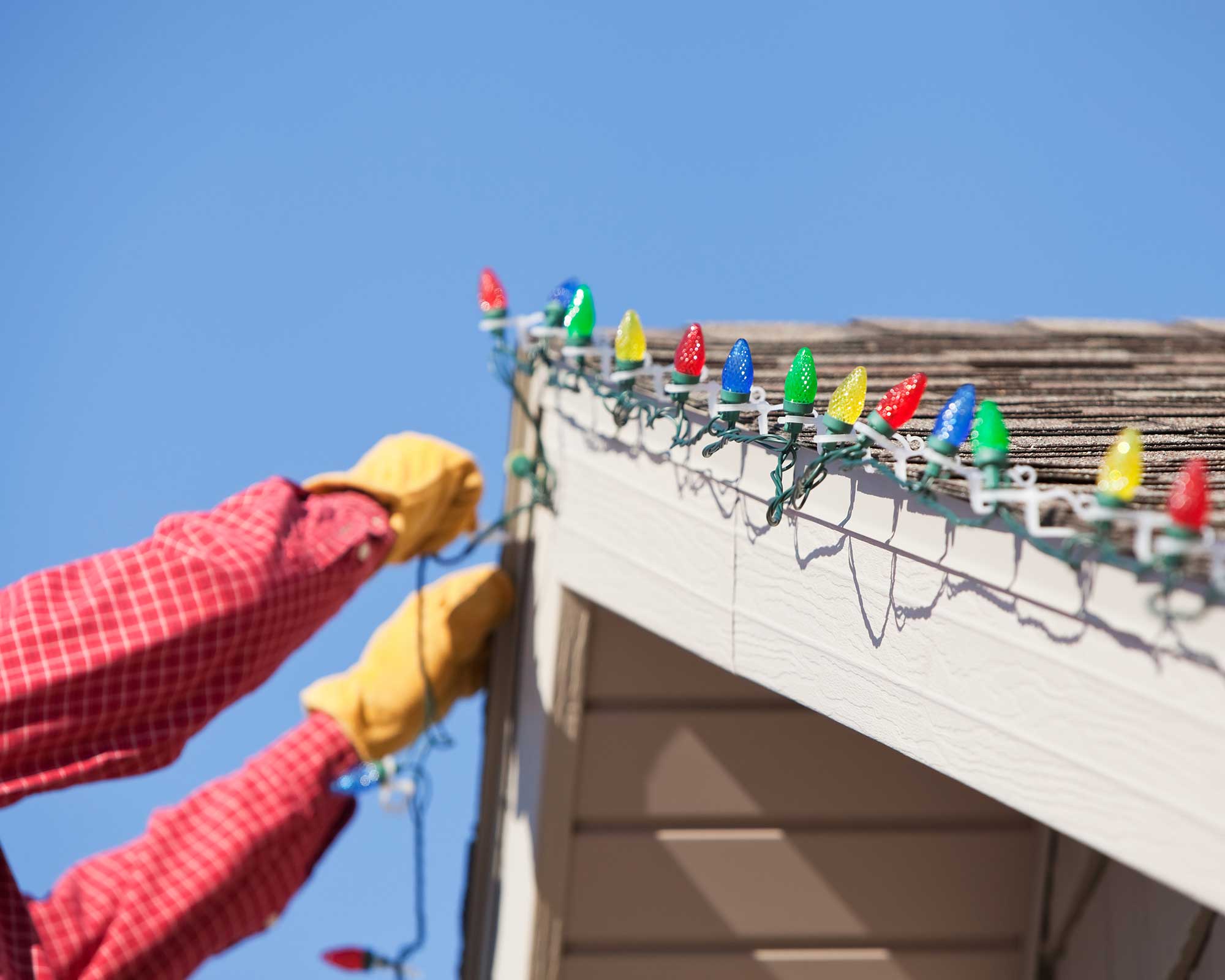 installing Christmas lights on to roof