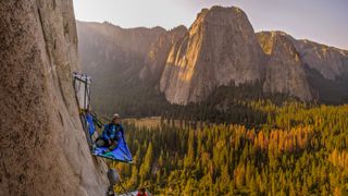 Two rock climbers on portaledges on triple direct, El Capitan