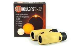 A pair of yellow sunoculars that look like binoculars placed next to their packaging box against a white background.