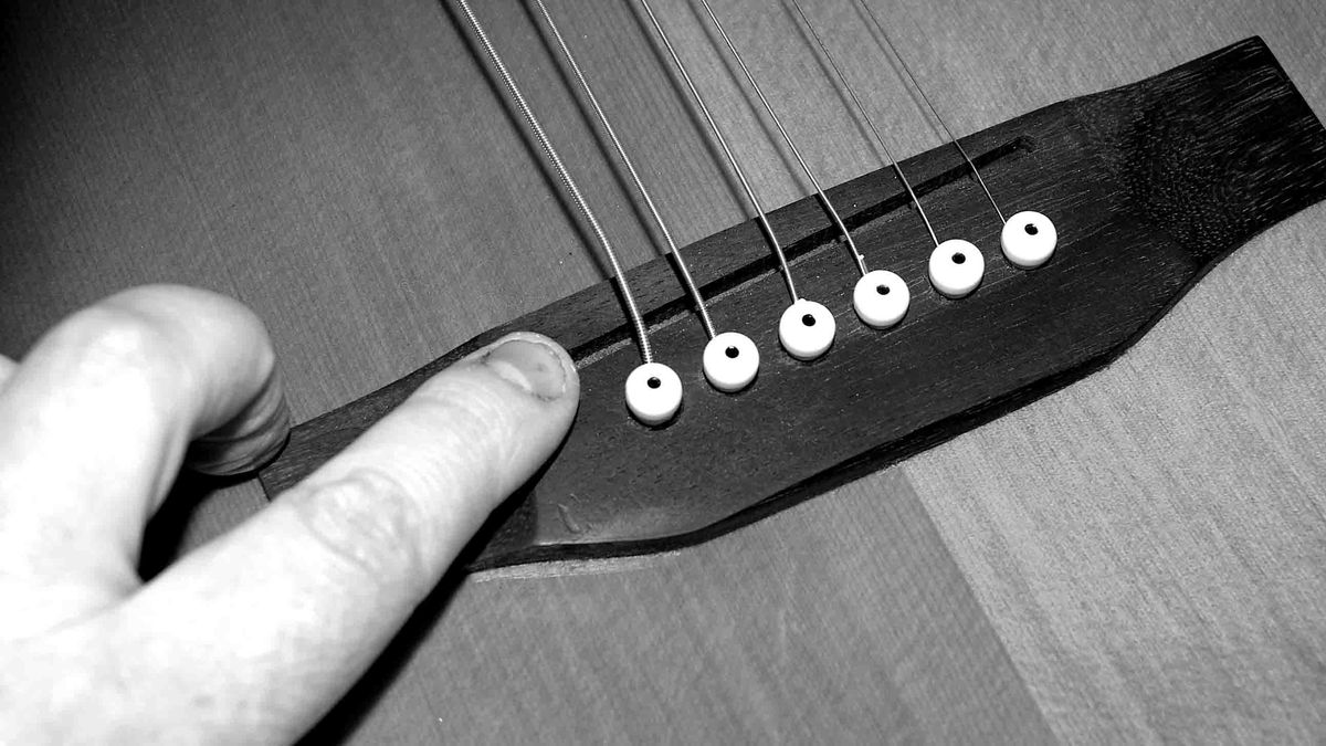Guitar setup how to lower your acoustic guitar's action MusicRadar