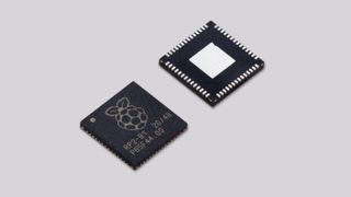 Raspberry Pi RP2040 chip against a grey background