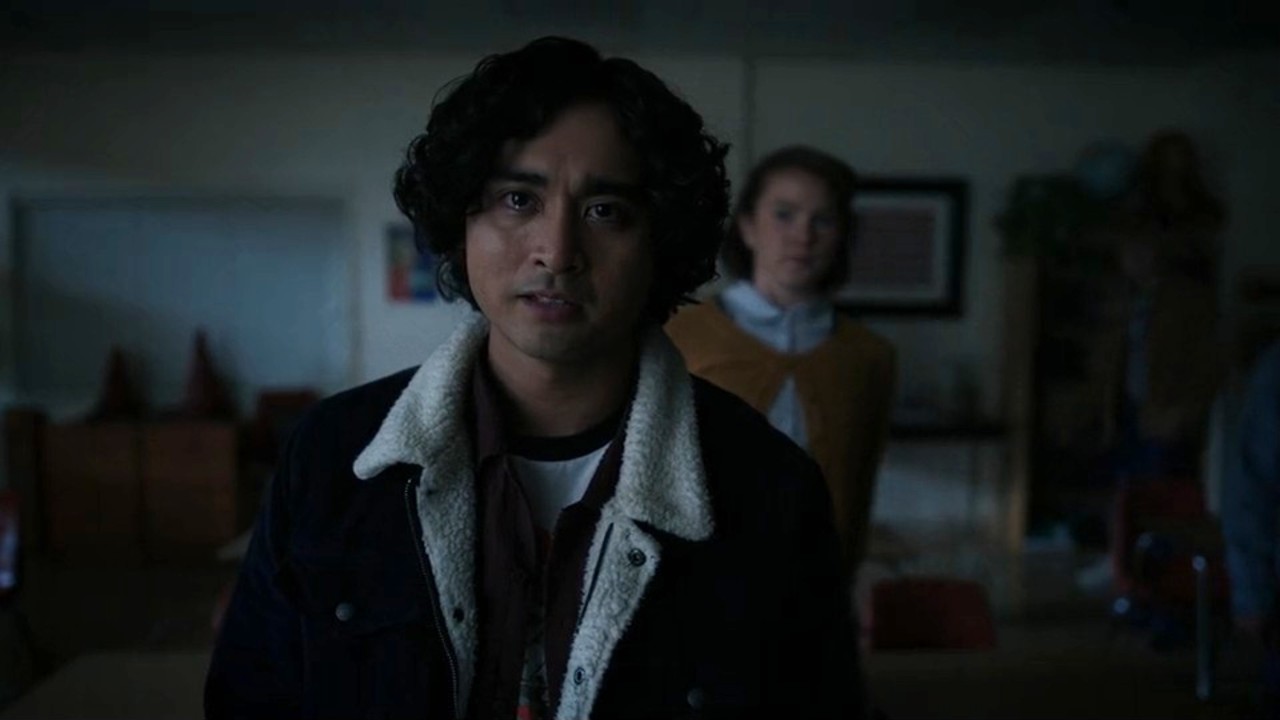 Kristian Ventura standing in front of Jess Gabor in School Spirits/