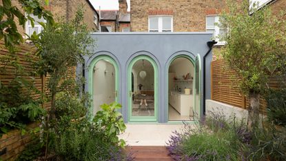 Arched doors Blue and green arches on a London terrace house extension