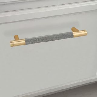 Grey and gold kitchen cabinet handle