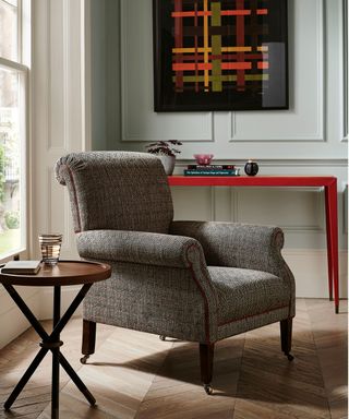 grey armchair with sidetable